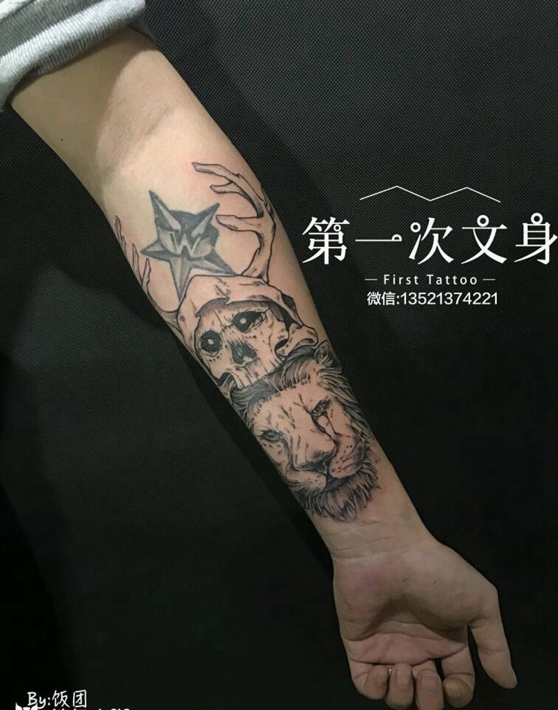狮子与骷髅纹身图片_手臂动物成品纹身图案