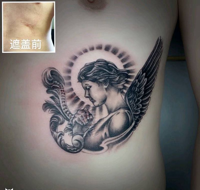 遮盖纹身图片_腰部欧美写实纹身图案
