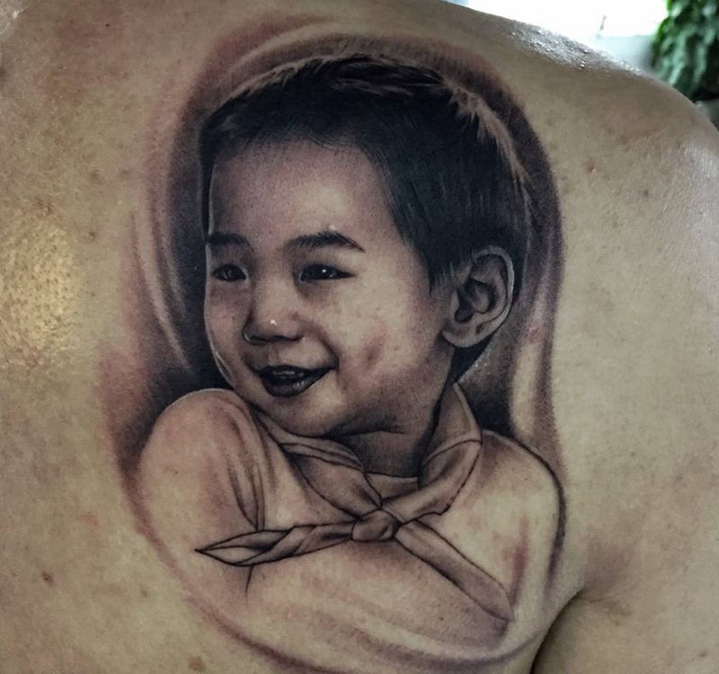 肖像纹身图片_欧美写实人物原创背部成品纹身图案