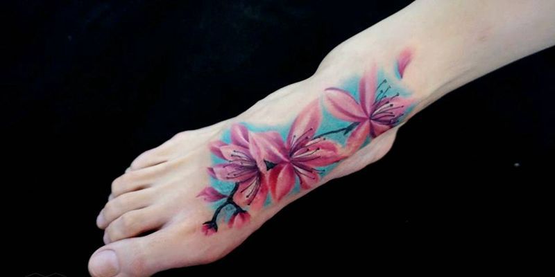 桃花遮盖伤疤纹身图片_手臂腿部脚部欧美写实植物原创成品纹身图案