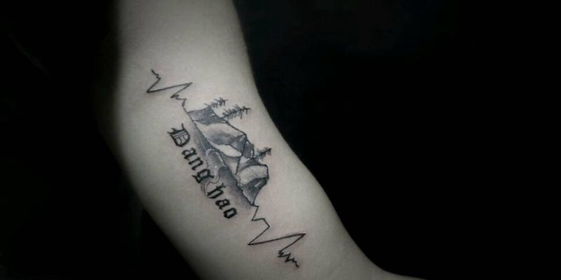 专属心电图纹身图片_手臂欧美写实几何静物成品纹身图案