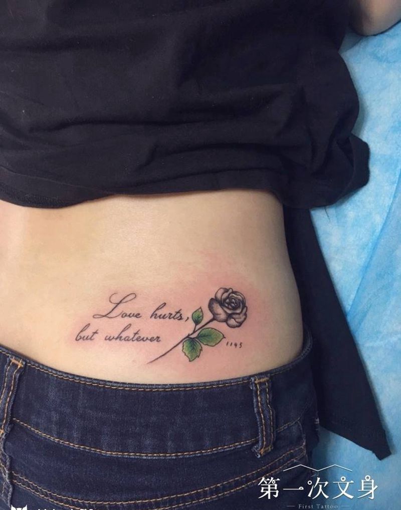 艺术字纹身图片_腰部花体字纹身图案