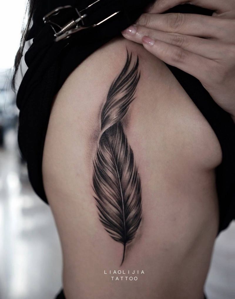 羽毛纹身图片_成品写实腰部原创纹身图案