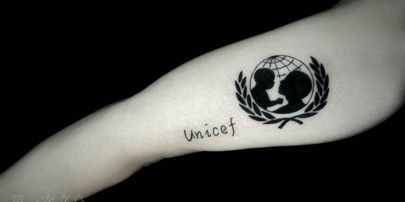 联合国儿童基金会纹身图片_手臂欧美几何字符人物成品纹身图案