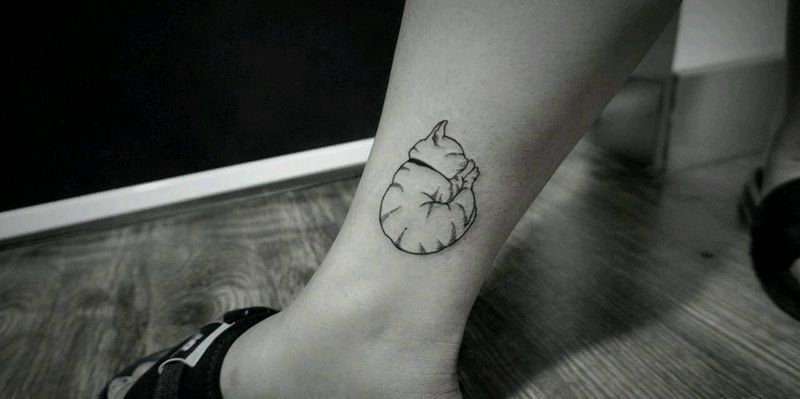 猫咪纹身图片_腿部欧美清新动物成品纹身图案