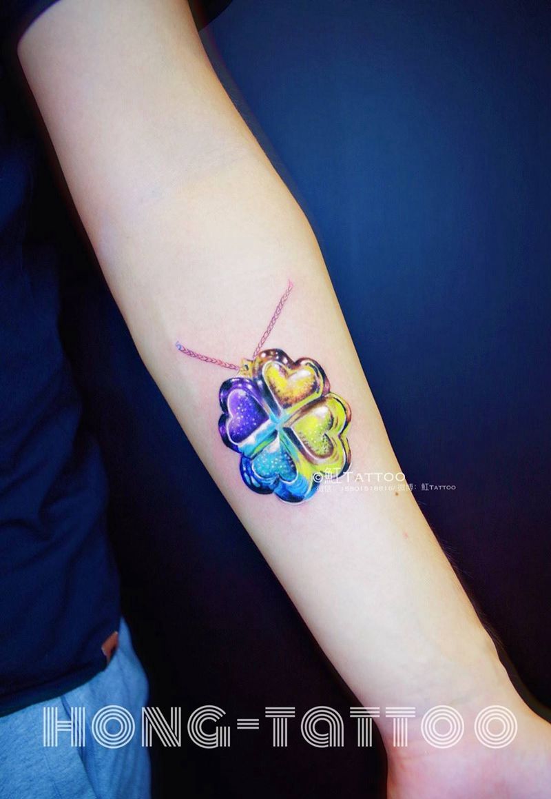 琉璃四叶草纹身图片_成品手臂写实欧美原创静物字符纹身图案