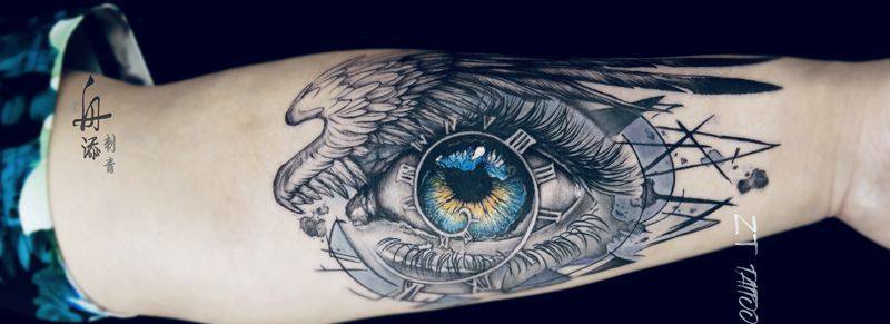 梦想之眼纹身图片_手臂欧美写实几何眼睛翅膀纹身图案