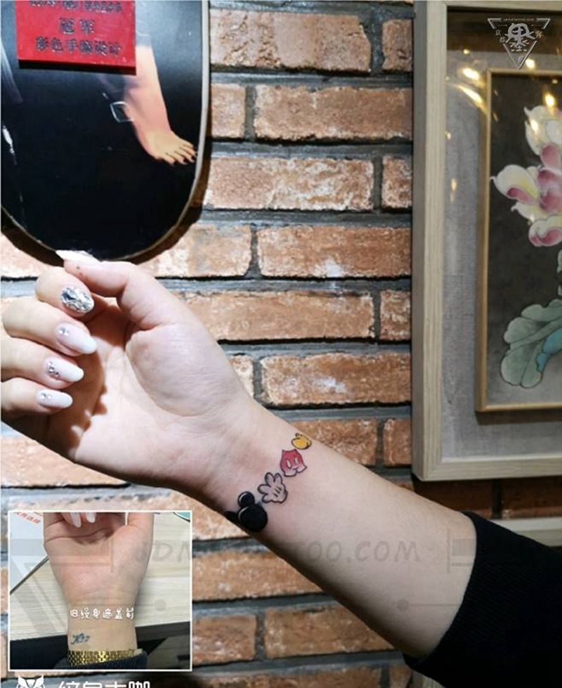 纹身/刺青/遮盖纹身图片_手臂水彩遮盖纹身图案