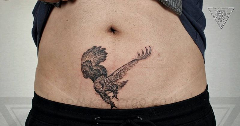 北京纹身/望京纹身/雄鹰纹身纹身图片_腹部欧美写实点刺纹身图案