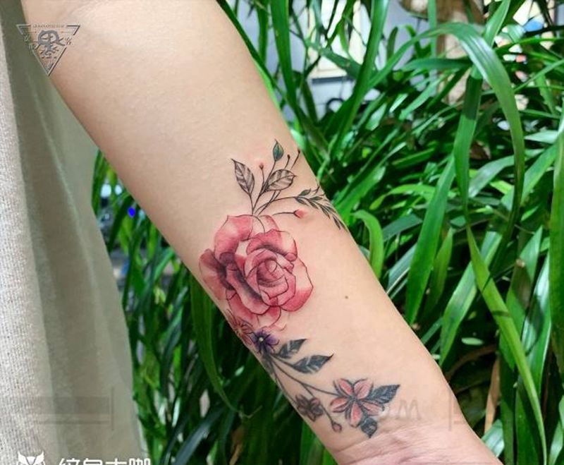 北京纹身/望京纹身/旧纹身修改纹身图片_手臂水彩纹身图案