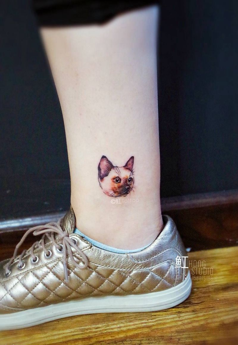 脚踝小猫头纹身图片_成品脚部清新动物纹身图案