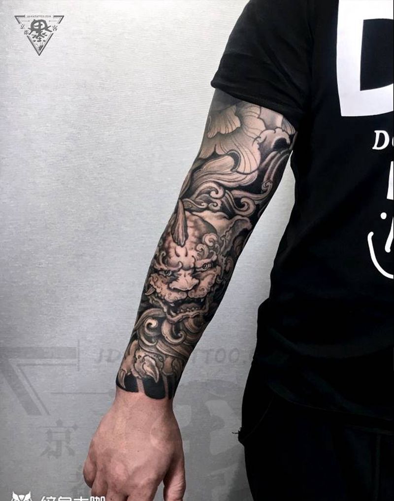 纹身/刺青/唐狮子纹身图片_手臂新传统纹身图案