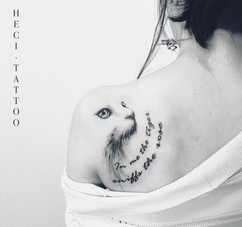 喵纹身图片_成品背部纹身图案