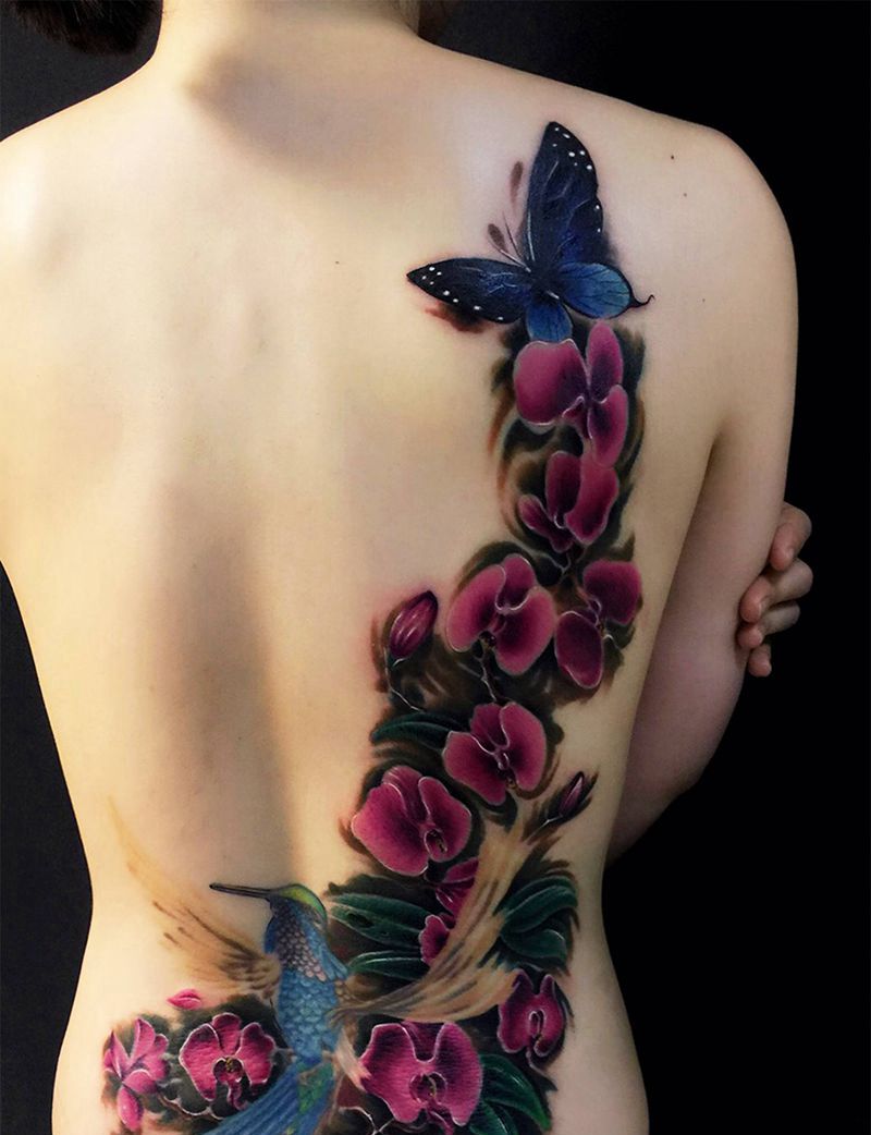 蝴蝶兰纹身图片_腰部背部欧美写实蝴蝶兰半背欧美彩色纹身图案