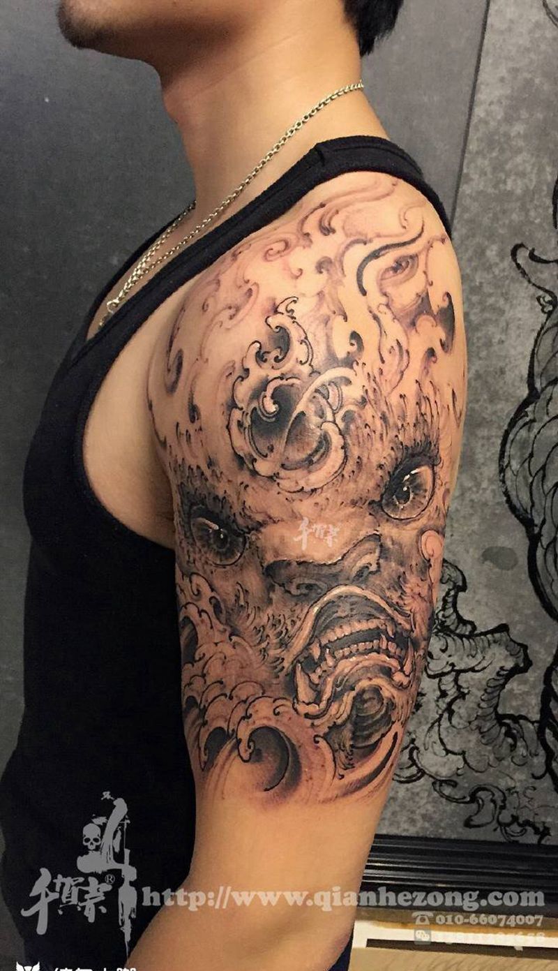 唐狮子纹身图片_欧美传统国画写实成品肩部鬼神动物原创纹身图案