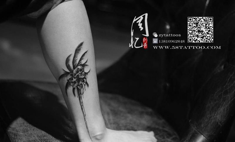 小腿外侧骷髅椰子树纹身图片_