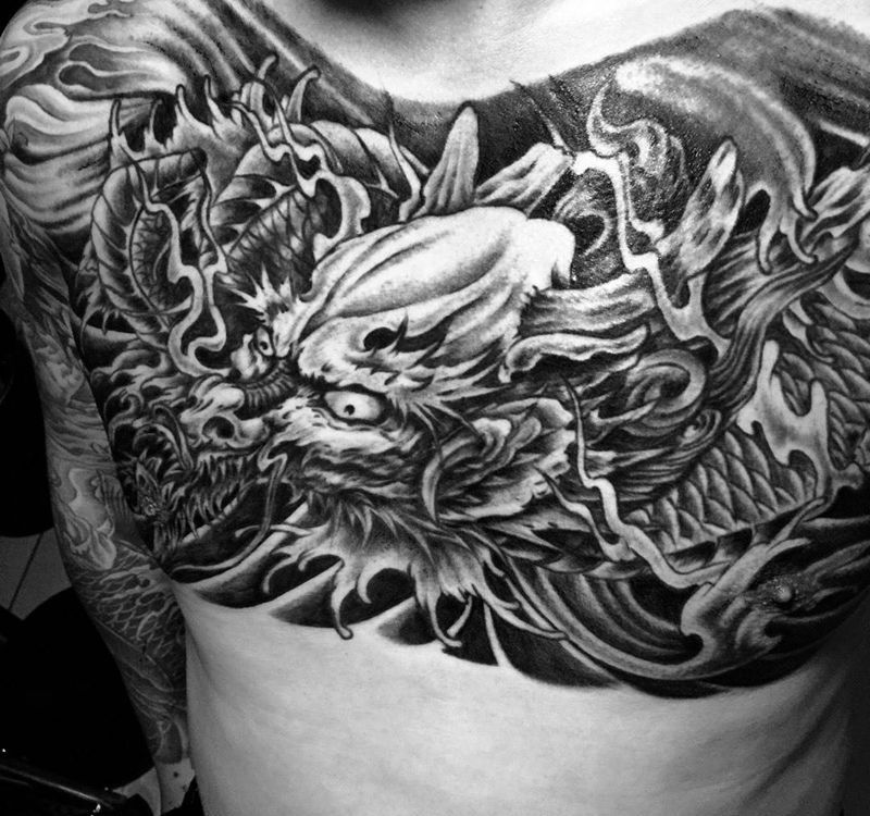 今日工作花胸龙头纹身图片_传统动物胸部纹身图案