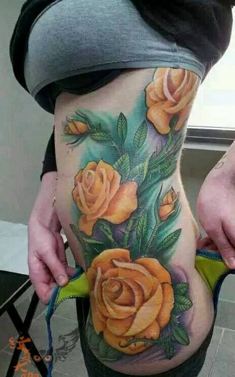 侧腰纹身图片_腰部欧美写实植物纹身图案