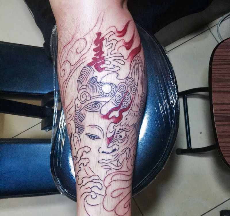 今日工作小腿一念之间割线纹身图片_腿部传统人物宗教纹身图案