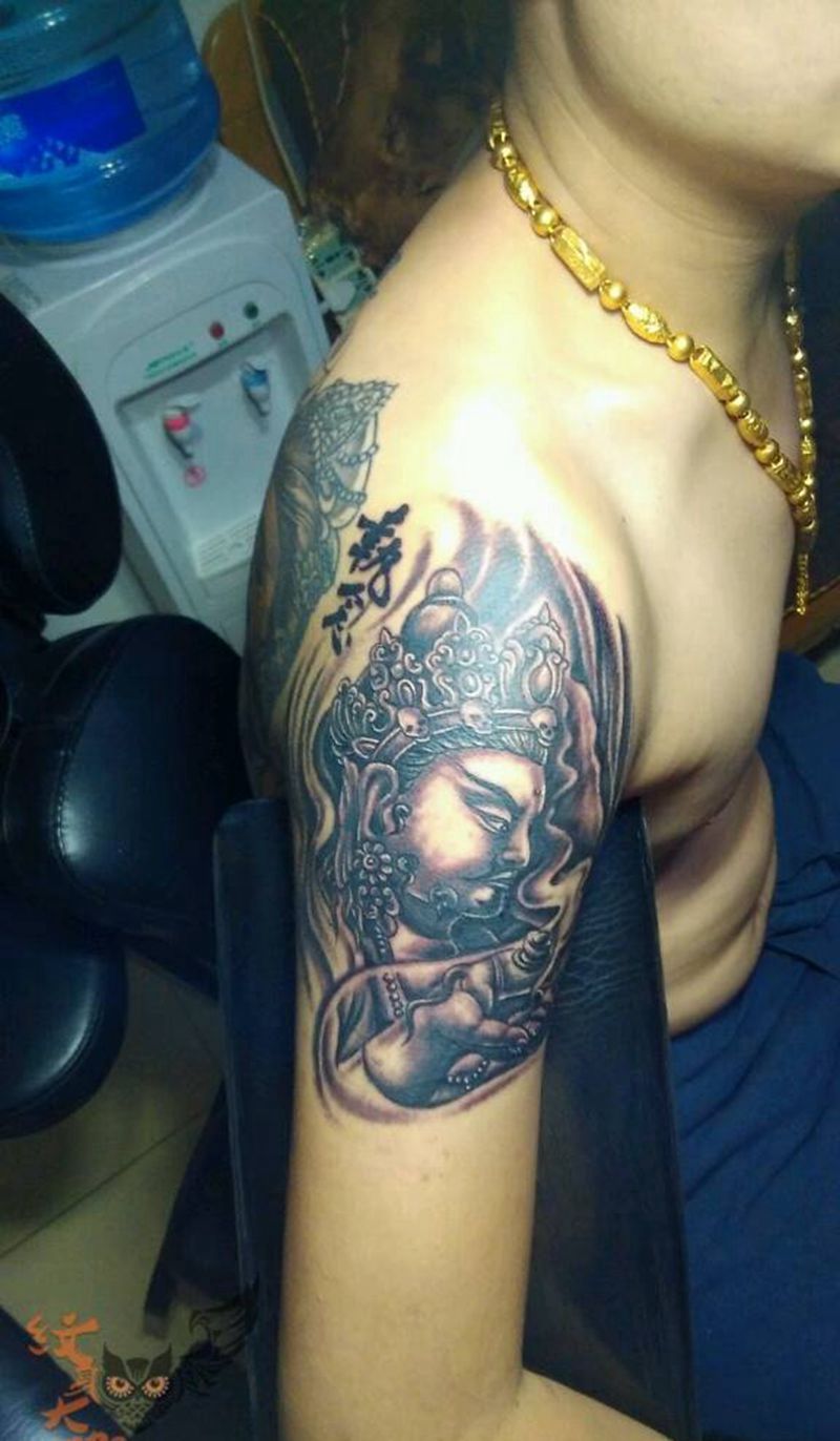 今日作品大臂黄财神纹身图片_手臂传统人物鬼神宗教纹身图案