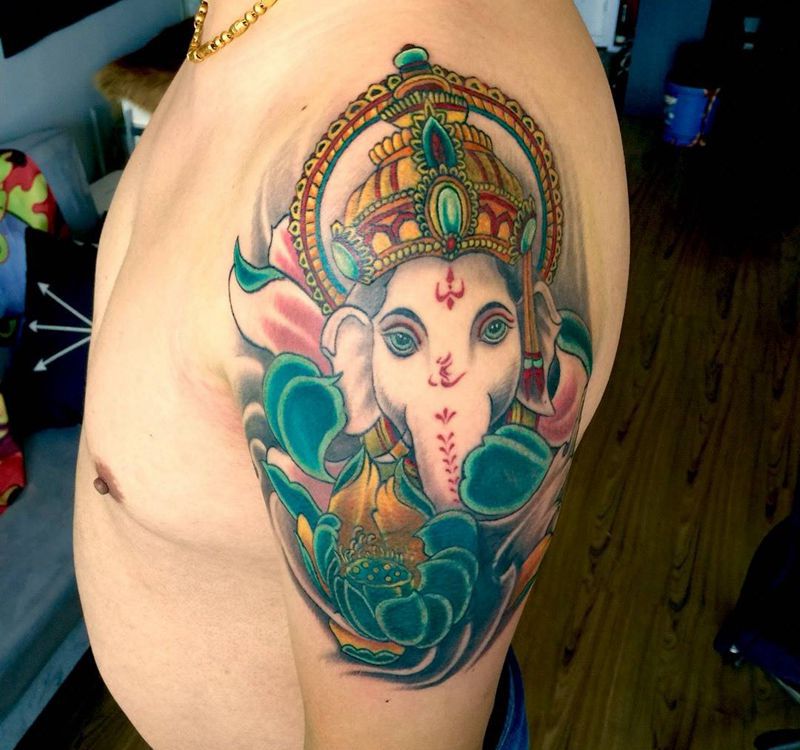 今日工作大臂遮盖完成纹身图片_成品手臂传统动物宗教植物纹身图案