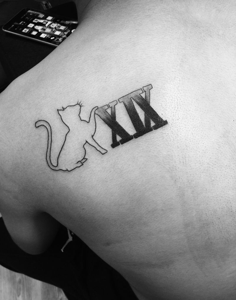 设计镂空猫纹身图片_