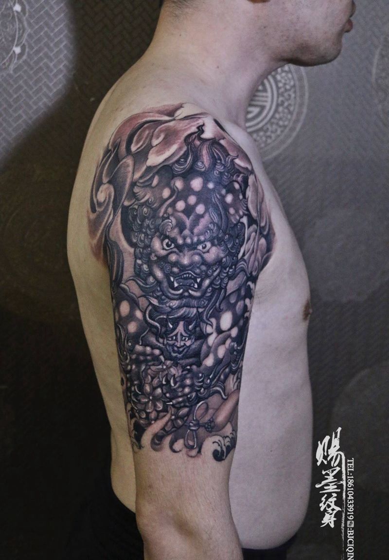 大臂狮子纹身图片_新传统纹身图案