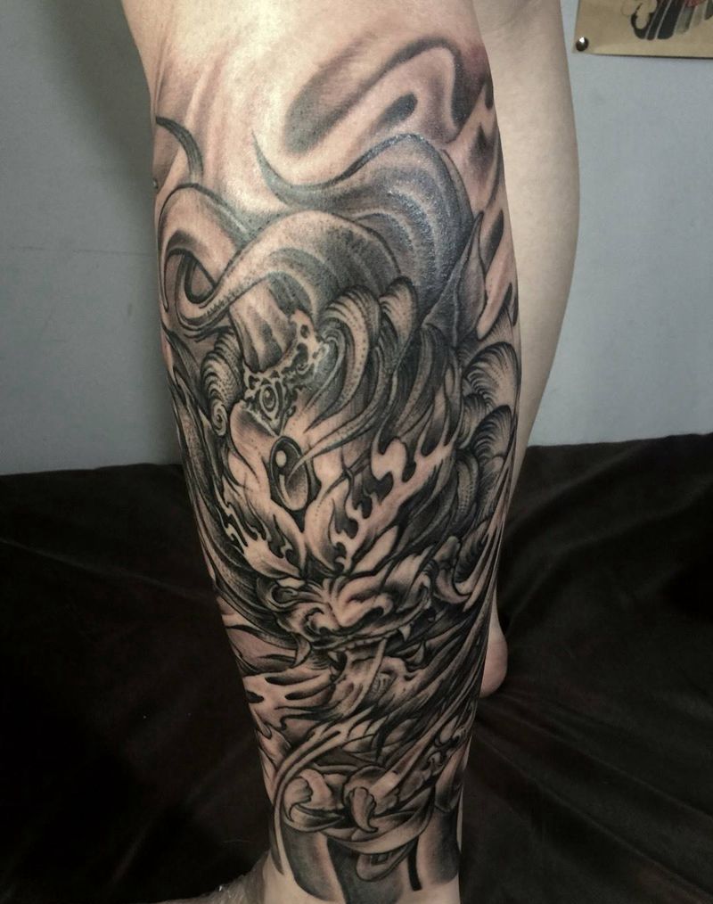 龙狮包小腿纹身图片_成品腿部传统动物纹身图案