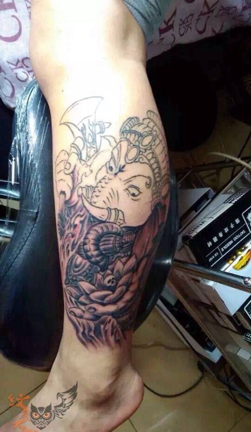 小腿象神纹身图片_