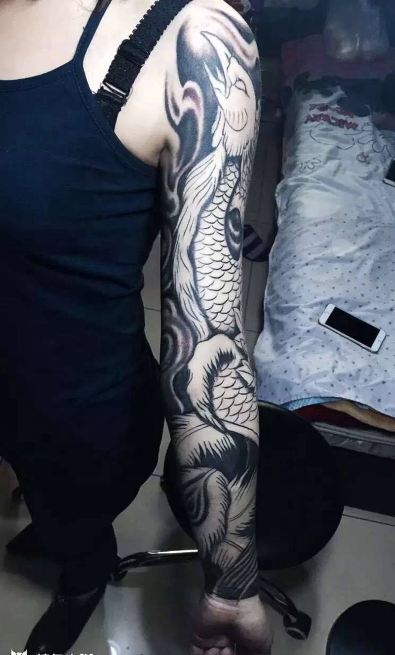 凤凰花臂未完成纹身图片_