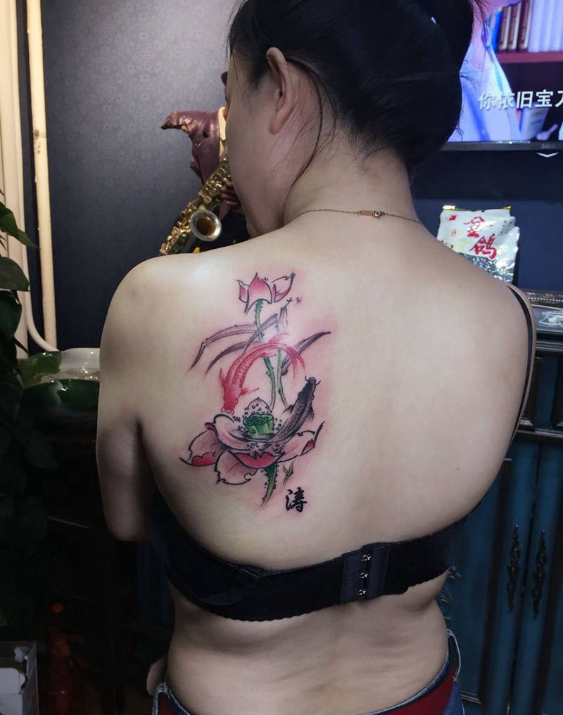 荷花鱼纹身图片_