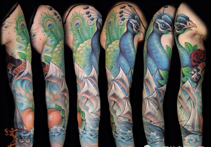 每日素材更新-孔雀纹身图片_