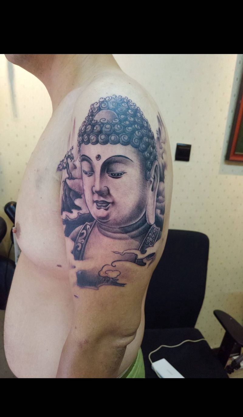 大臂佛头纹身图片_