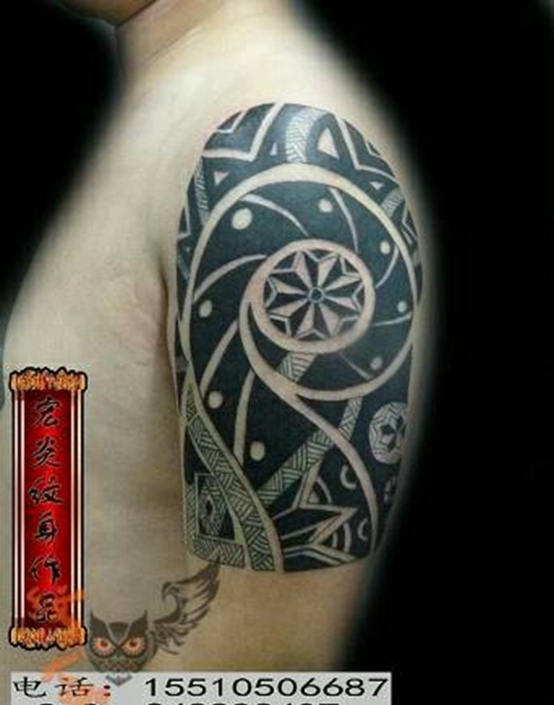 图腾包大臂纹身图片_肩部手臂传统图腾纹身图案