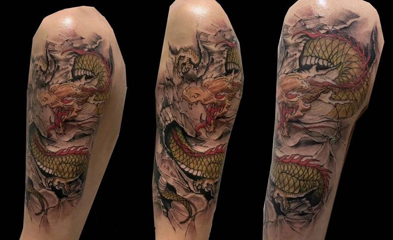 金龙纹身图片_手臂新传统纹身图案