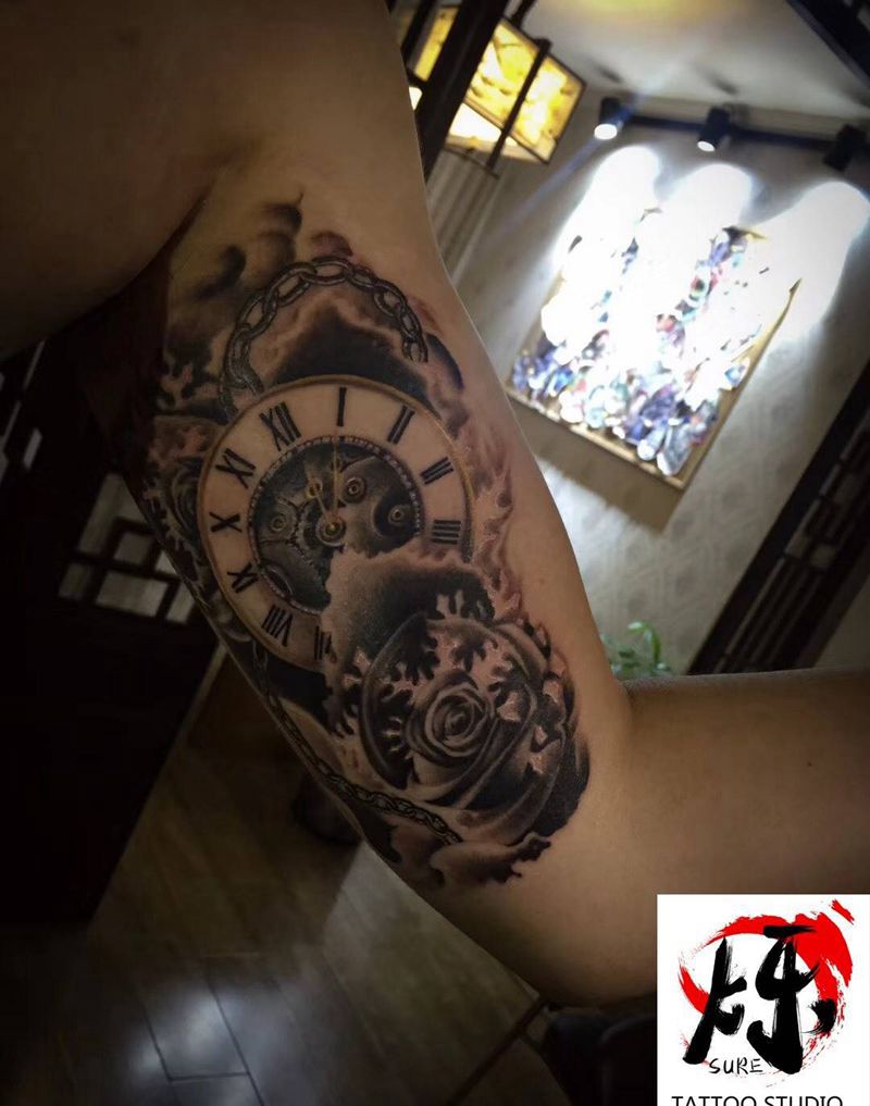 钟表加雪花纹身图片_