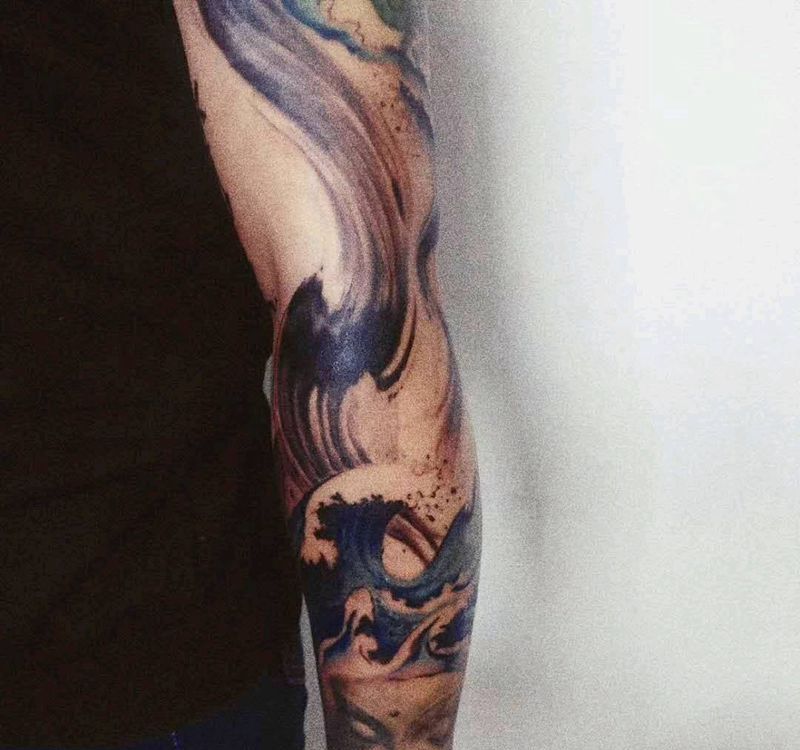 行云纹身图片_手臂国画宗教成品纹身图案