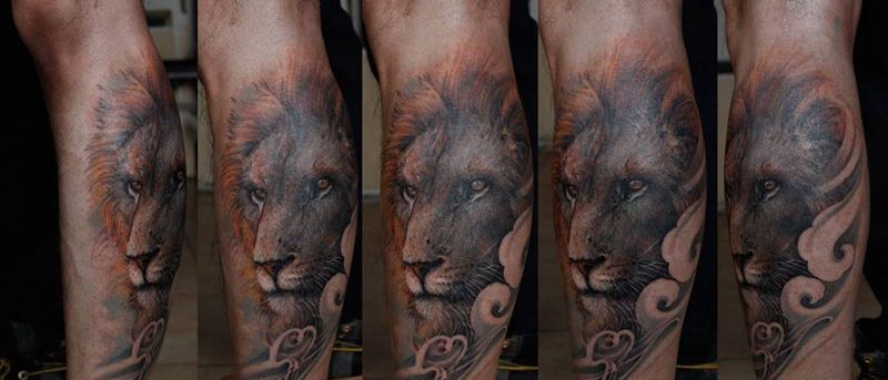 狮子纹身图片_成品原创动物腿部欧美写实纹身图案