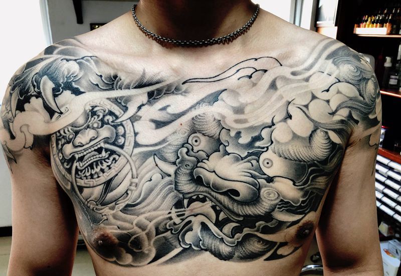 唐狮牡丹花胸纹身图片手臂肩部新传统纹身图案