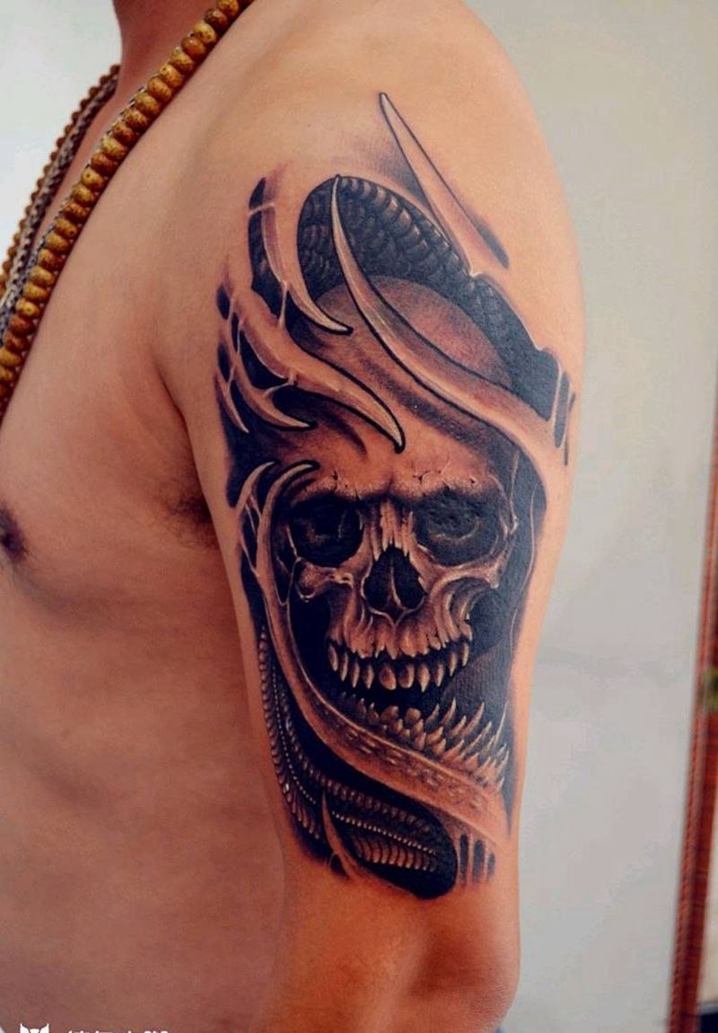 骷髅覆盖小飞龙纹身图片_欧美风格纹身图案