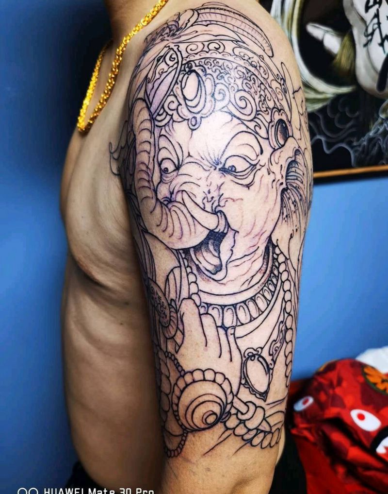 象神割线完成纹身图片_手臂新传统纹身图案