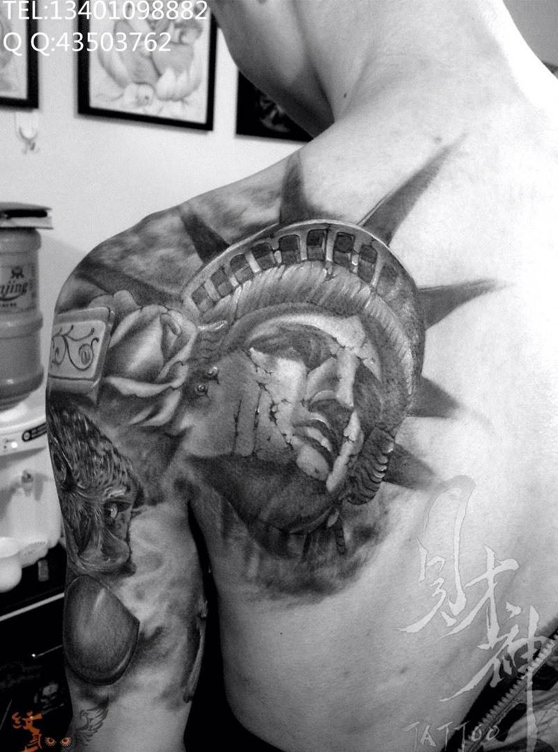 欧美风格自由女神纹身图片_欧美肖像人物原创背部手臂写实纹身图案