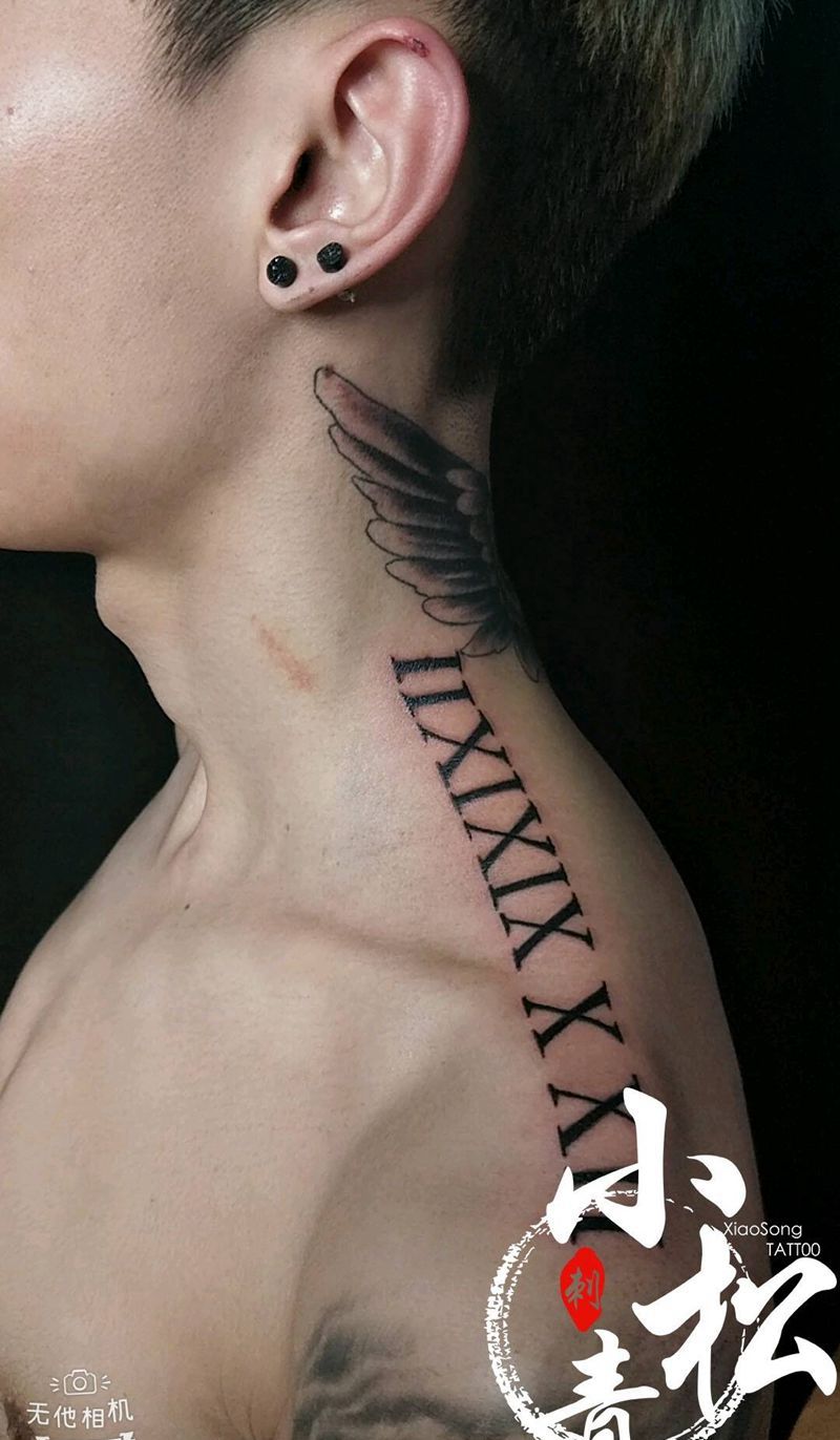 歌星【贾斯丁比伯】同款翅膀纹身图片_颈部花体字欧美写实纹身图案
