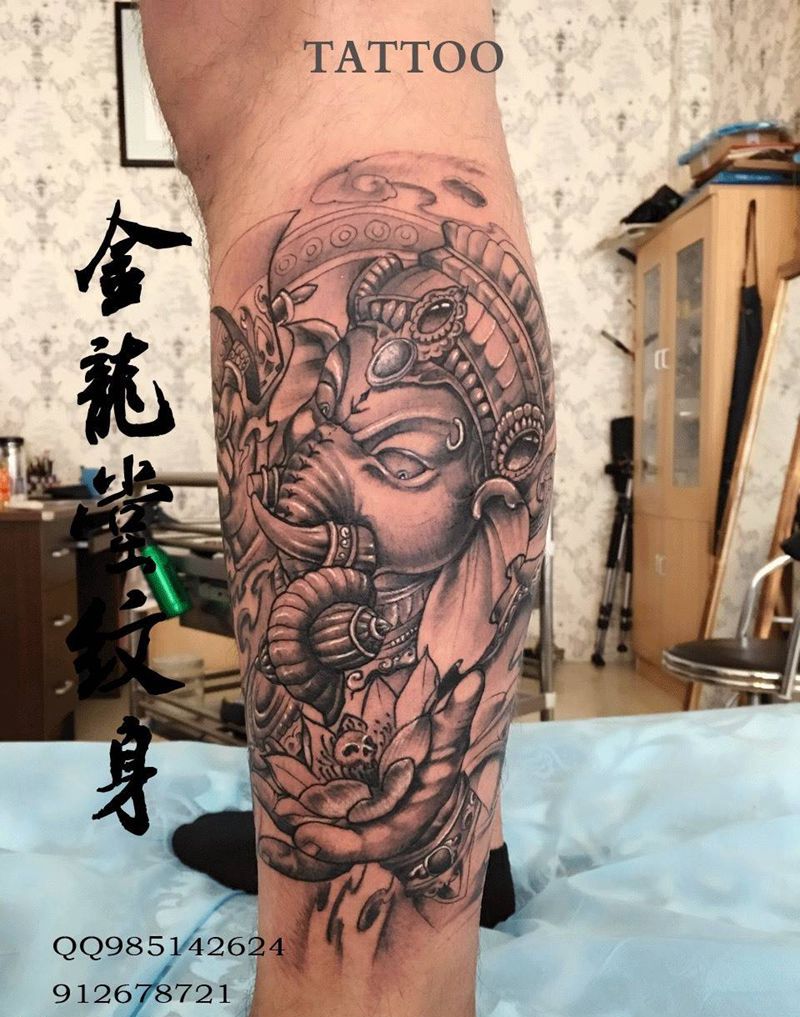 小腿象神纹身图片_成品腿部传统动物宗教纹身图案