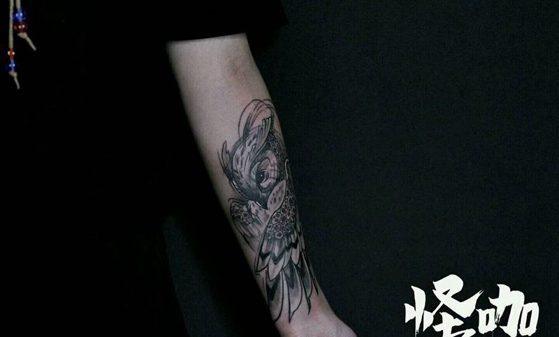 猫头鹰纹身图片_手臂写实动物原创成品纹身图案