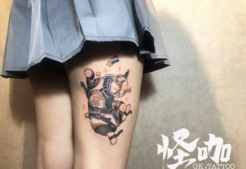 要做一只有梦想的喵纹身图片_腿部纹身图案