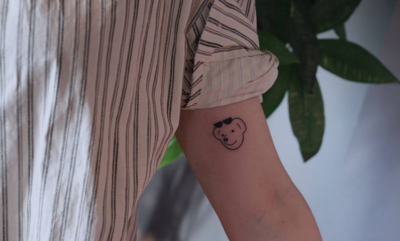 小熊维尼纹身图片_手臂纹身图案