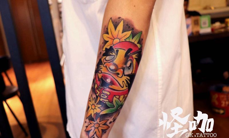 达摩蛋纹身图片_手臂纹身图案