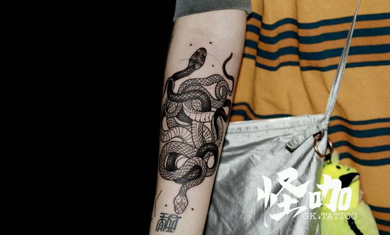 蛇纹身图片_手臂纹身图案