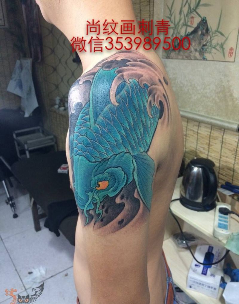 鱼纹身图片_传统动物手臂纹身图案